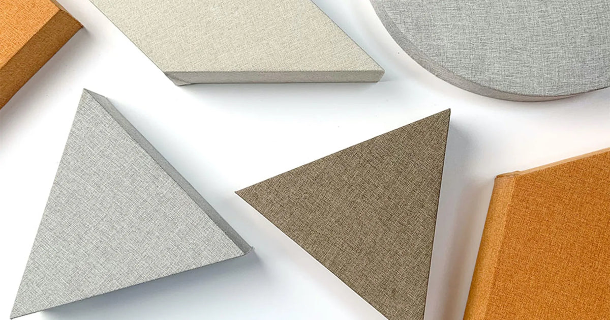 Fabric swatch samples for acoustic pod upholstery, multi‑colour sound absorbing fabric options for office booth interior