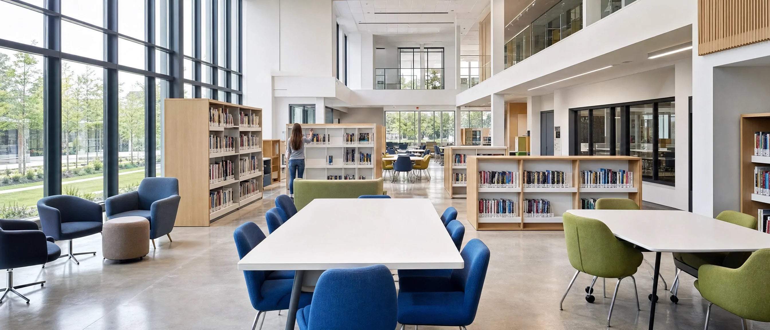 School furniture contact page with modern library tables, chairs and bookshelves for custom learning space enquiries